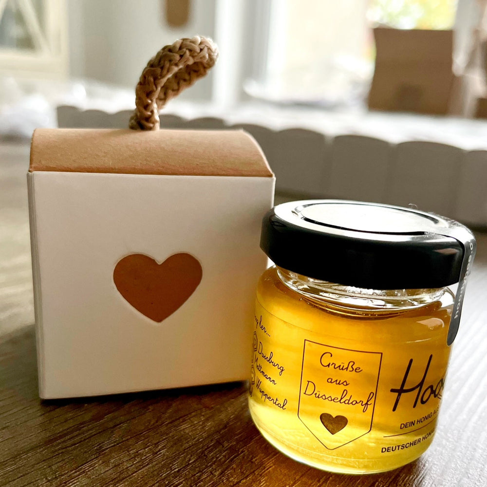 
                  
                    "Grüße aus"-Geschenk Honigbox, 50g (Preisstaffel)
                  
                